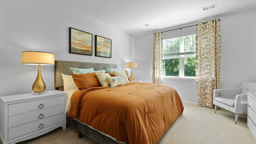 Furnished interior view inside a new home in Pine Hills at Cane Bay, Summerville (Image 37).