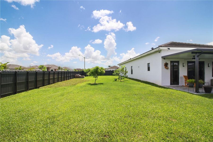 Front exterior of a new home in , Homestead, FL, highlighting curb appeal (Image 24).