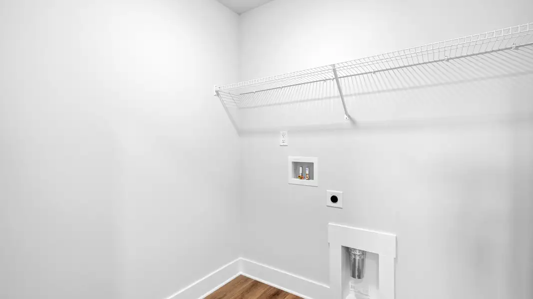 2 story single family home, all white, laundry room