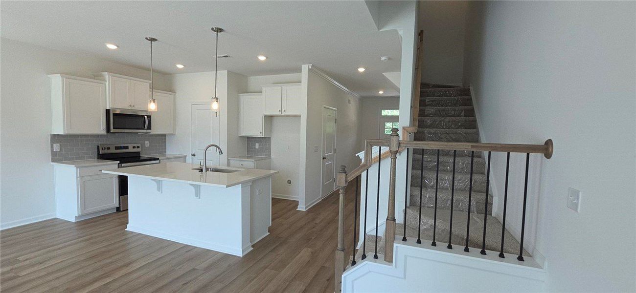 Furnished interior view inside a new home in Meece Townhomes, Easley (Image 4). Furnished interior view inside a new home in Meece Townhomes, Easley (Image 4).