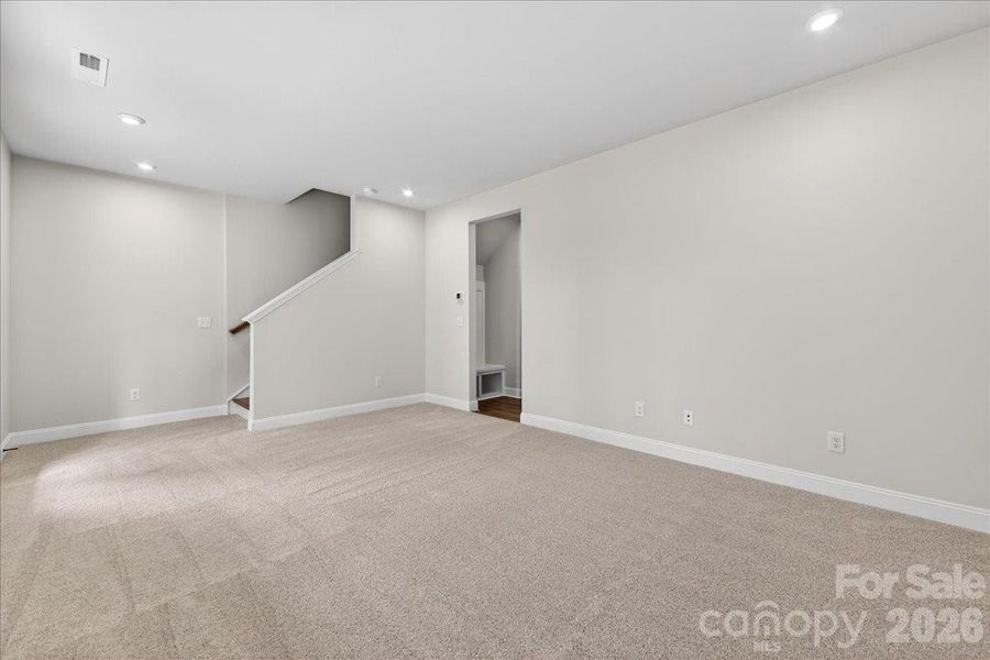 Light filled first floor flex space with access to the covered outdoor living