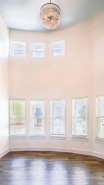 Formal and casual dining with chandelier light and high ceilings Formal and casual dining with chandelier light and high ceilings