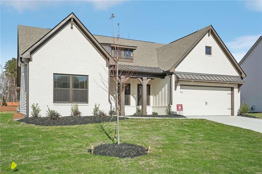 Front exterior of a new home in Pinecrest Ridge, Dacula, GA, highlighting curb appeal (Image 28). Front exterior of a new home in Pinecrest Ridge, Dacula, GA, highlighting curb appeal (Image 28).
