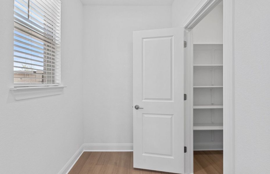 Spacious, unfurnished interior of a new home in Bluffview Reserve, Leander (Image 56).