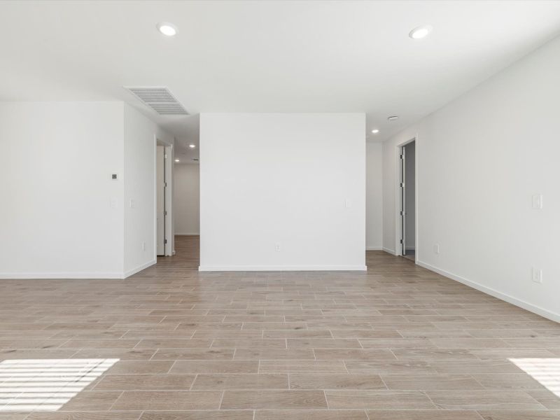 Spacious, unfurnished interior of a new home in Rancho Mirage Estate Series, Maricopa (Image 10).
