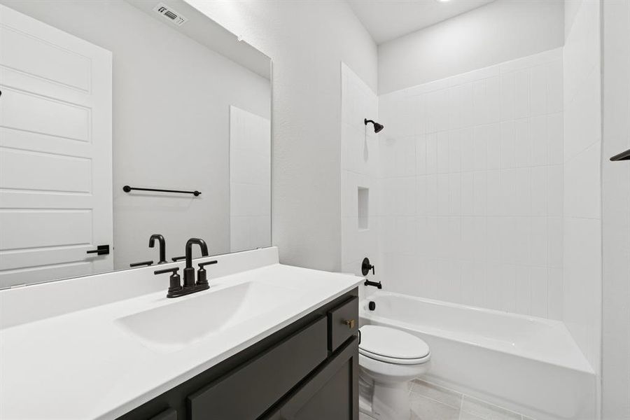 Furnished interior view inside a new home in Painted Tree - Classic Series, McKinney (Image 11). Furnished interior view inside a new home in Painted Tree - Classic Series, McKinney (Image 11).