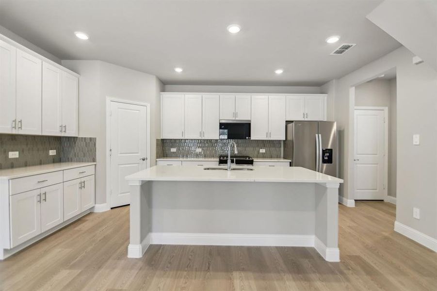 Photo is not of the actual home, but is an inspirational photo of builder’s model home and may depict options, furnishings, and/or decorator features that are not included.