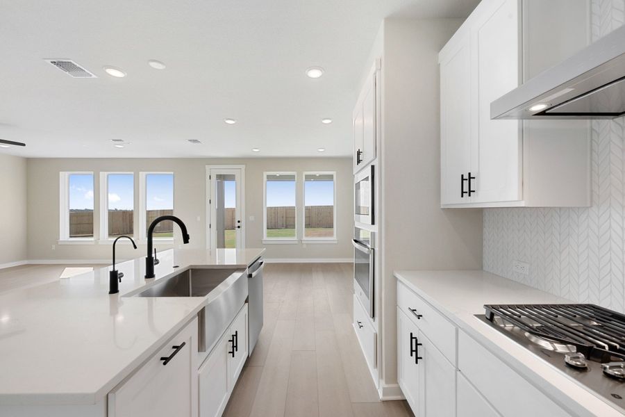 Furnished interior view inside a new home in Terrace Collection At Turner's Crossing, Buda (Image 8).