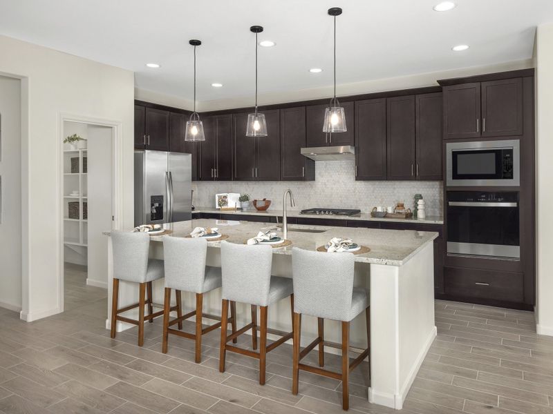 Enjoy plenty of seating and counterspace at the large kitchen island.