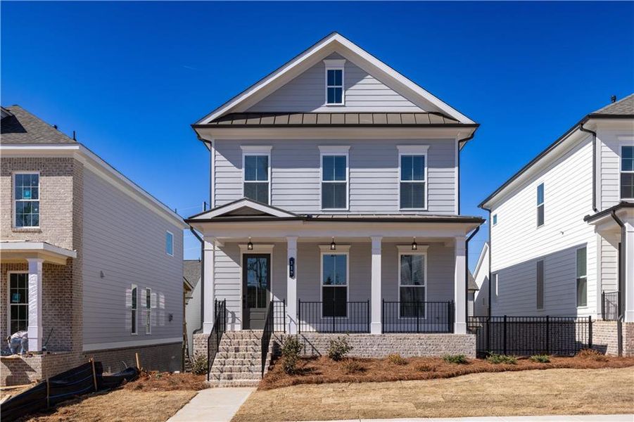 Front exterior of a new home in Brackley Single Family, Cumming, GA, highlighting curb appeal (Image 1).