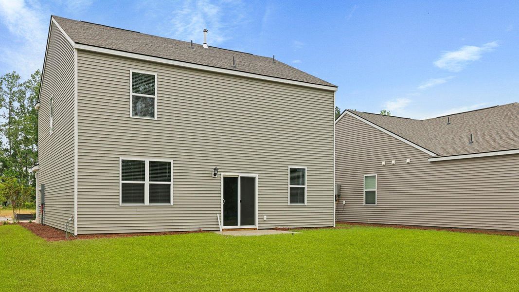 Front exterior of a new home in Pineview North, Summerville, SC, highlighting curb appeal (Image 1).