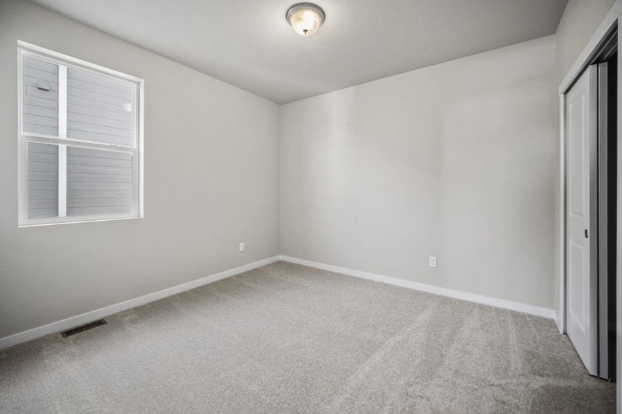 Representative unfurnished interior of a home built from the Lilac by View Homes in Aspen Ranch, Fountain (Image 34).