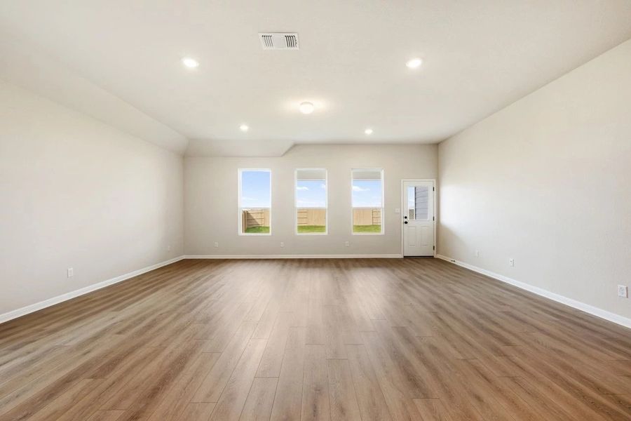 Spacious, unfurnished interior of a new home in The Colony 50s, Bastrop (Image 38).