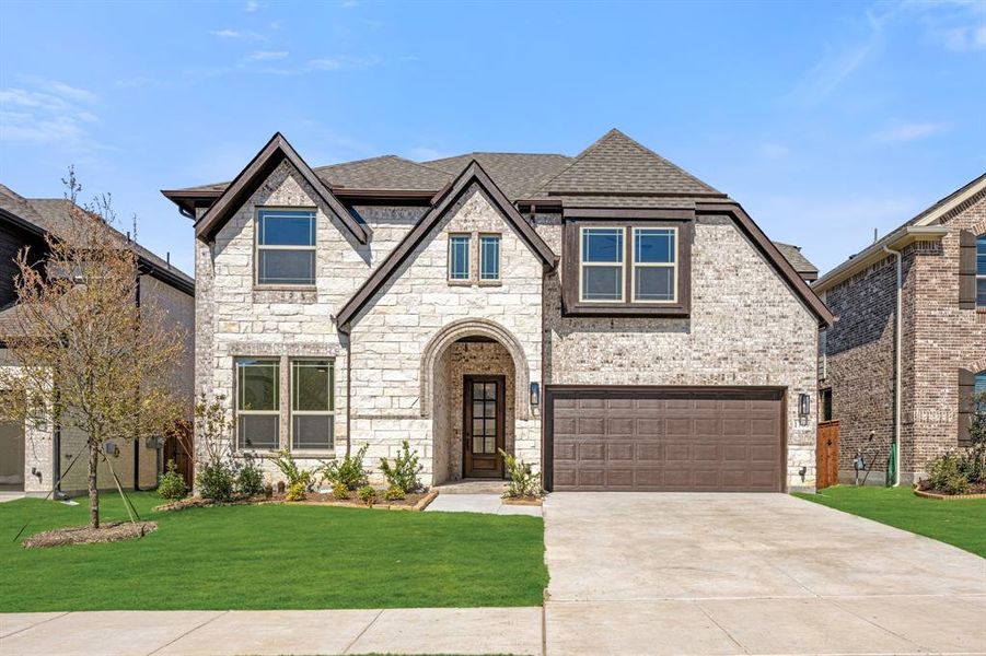 Front exterior of a new home in Willow Wood Classic 50, McKinney, TX, highlighting curb appeal (Image 18).