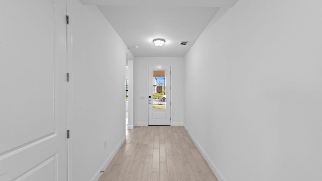 Spacious, unfurnished interior of a new home in SkySail, Naples (Image 15).