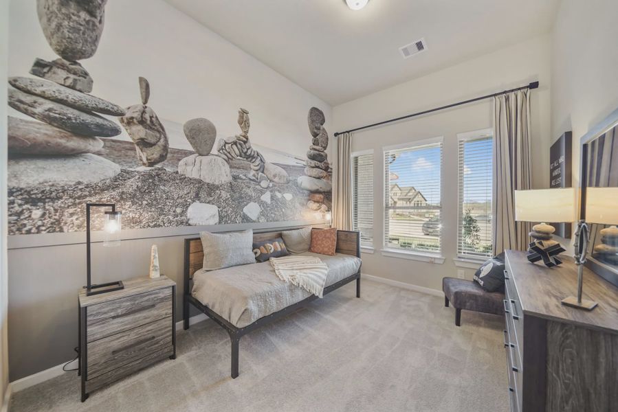 Representative furnished interior of a home built from the Montgomery by Chesmar Homes in Meridiana 50's and 60's, Manvel (Image 9).