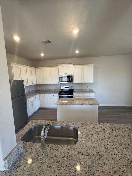 Furnished interior view inside a new home in Sweetwater Ridge, Conroe (Image 6).