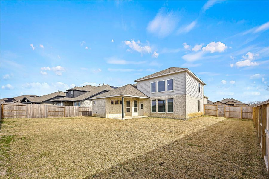 Exterior details and patio area of a home in River Ranch Meadows, Dayton (Image 4). Exterior details and patio area of a home in River Ranch Meadows, Dayton (Image 4).