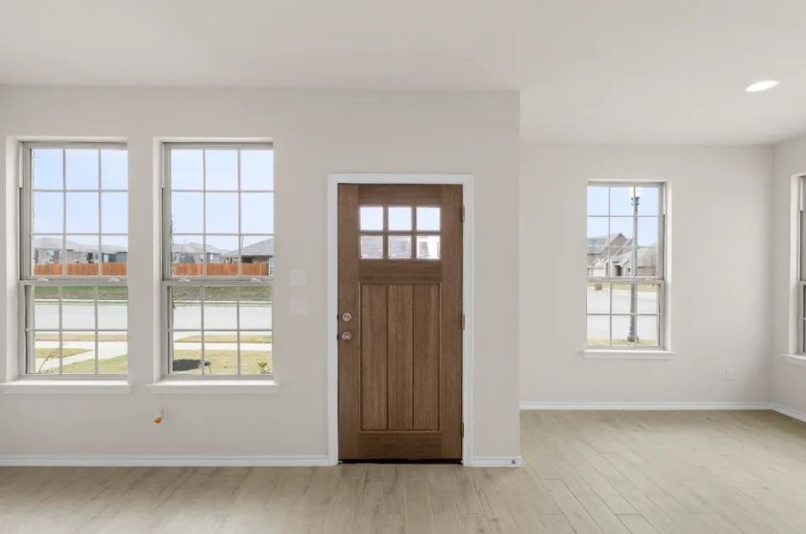 Front exterior of a new home in Sanger Circle, Sanger, TX, highlighting curb appeal (Image 22).