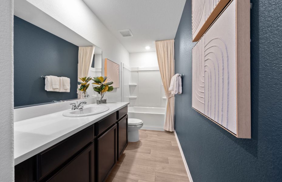 Representative furnished interior of a home built from the Kaufman by Pulte Homes in Strata, Dacono (Image 11).