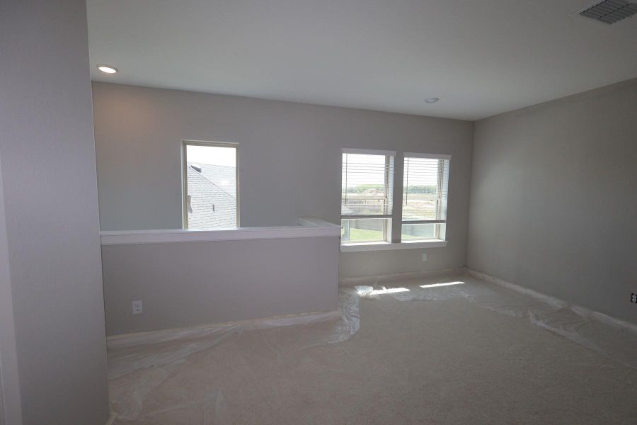 In-progress construction of a new home in Prairieland Village - Grove Collection, Cypress, TX (Image 21).