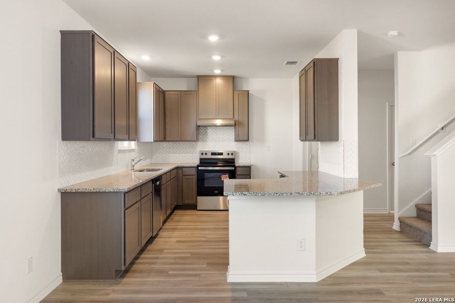 Furnished interior view inside a new home in , San Antonio (Image 8).