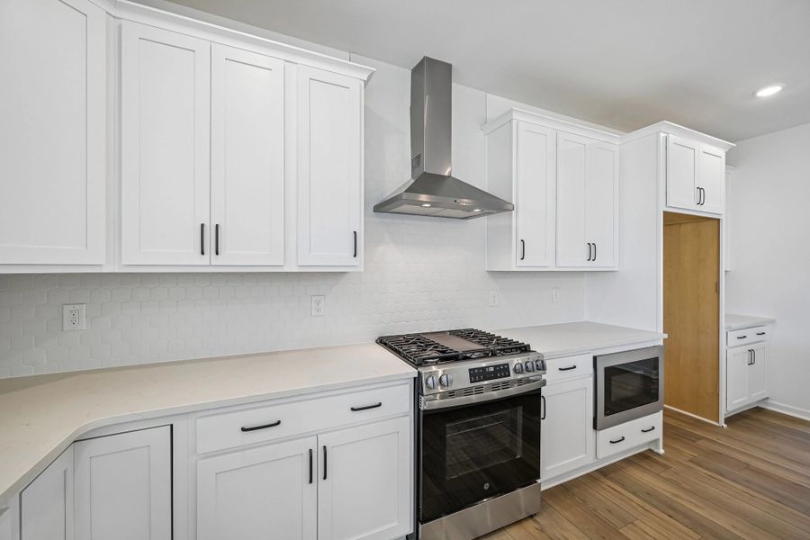 Kitchen featuring the AW Collection® Harmony - Smooth finishes and classic touches shine.