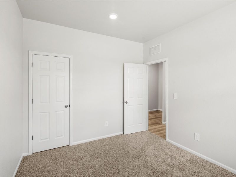 Spacious, unfurnished interior of a new home in Poudre Heights: The Lakes Collection, Windsor (Image 8).