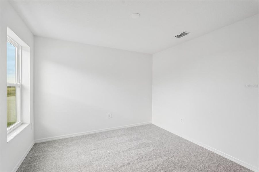 Spacious, unfurnished interior of a new home in Southpointe, Palmetto (Image 19). Spacious, unfurnished interior of a new home in Southpointe, Palmetto (Image 19).