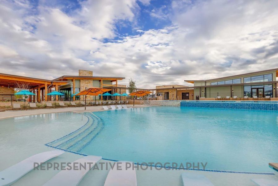 Front exterior of a new home in Elyson: 65ft. lots, Katy, TX, highlighting curb appeal (Image 2). Front exterior of a new home in Elyson: 65ft. lots, Katy, TX, highlighting curb appeal (Image 2).
