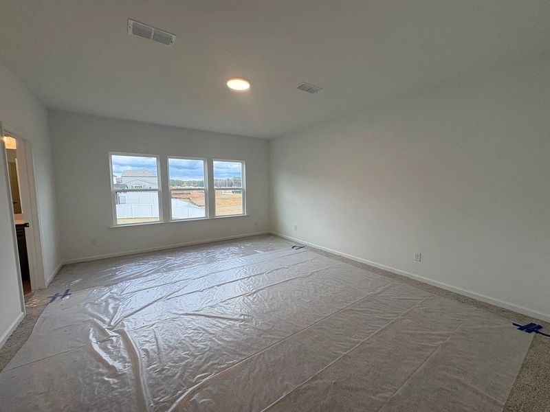 Primary Bedroom featuring AW Collection® Oxford - Calming flow with grounded sophistication. Primary Bedroom featuring AW Collection® Oxford - Calming flow with grounded sophistication.