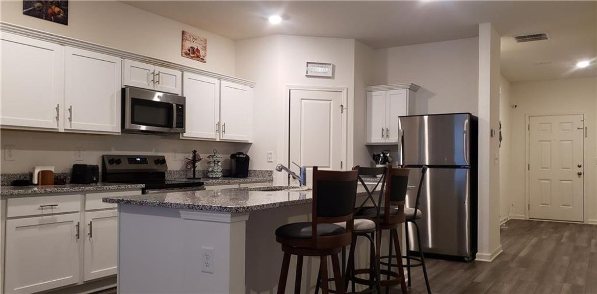 Furnished interior view inside a new home in Greyson Parc, Locust Grove (Image 13).