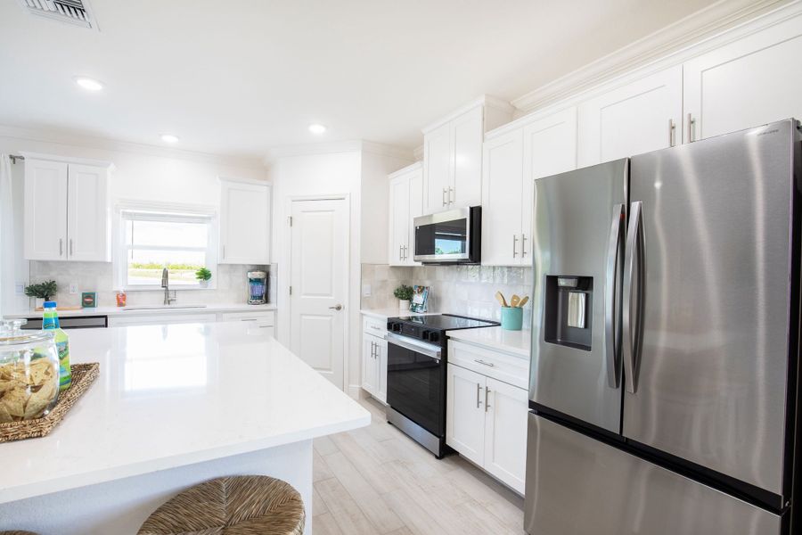 Furnished interior view inside a new home in Orchid Cove, Bokeelia (Image 6).