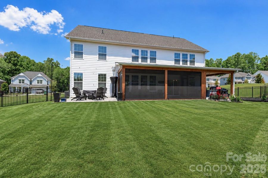 Exterior details and patio area of a home in Falls Cove, Troutman (Image 26).
