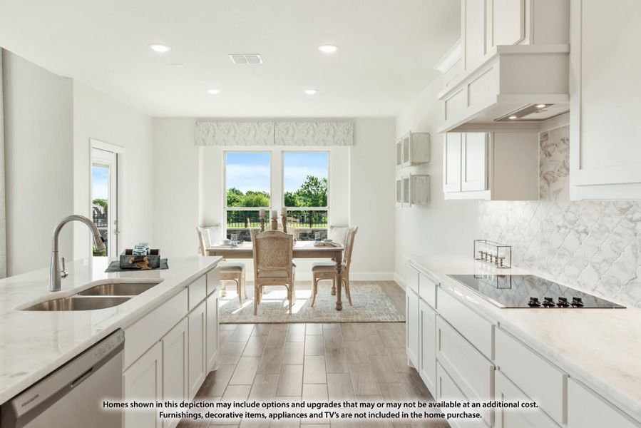 White kitchen with quartz countertops, marble backsplash, and dining area with large windows overlooking backyard.