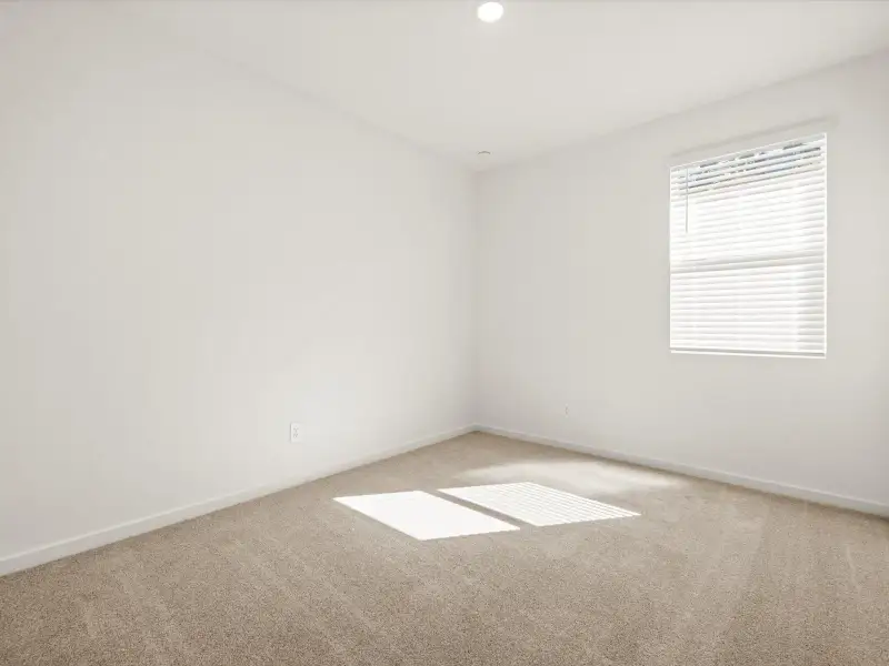 Spacious, unfurnished interior of a new home in Entrada Reserve Series, Tolleson (Image 12).