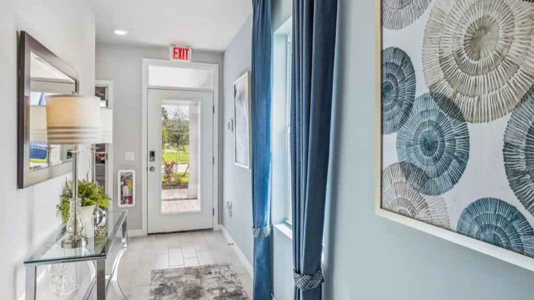 Representative furnished interior of a home built from the JEMISON by D.R. Horton in Asher Park, Lehigh Acres (Image 3).