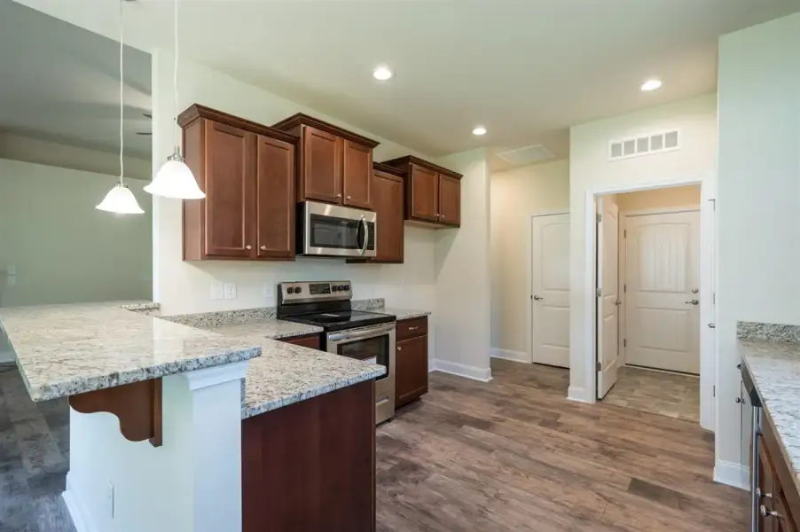 Representative furnished interior of a home built from the 1602-2 by Adams Homes in Ham Farm, La Grange (Image 4).
