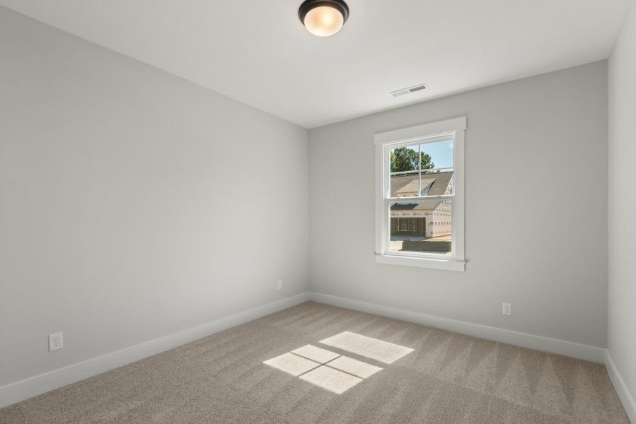 Spacious, unfurnished interior of a new home in Wexford, Elon (Image 54).