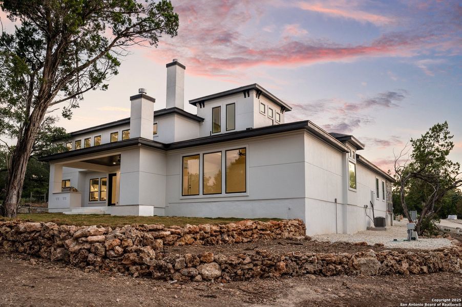 Front exterior of a new home in , New Braunfels, TX, highlighting curb appeal (Image 23).