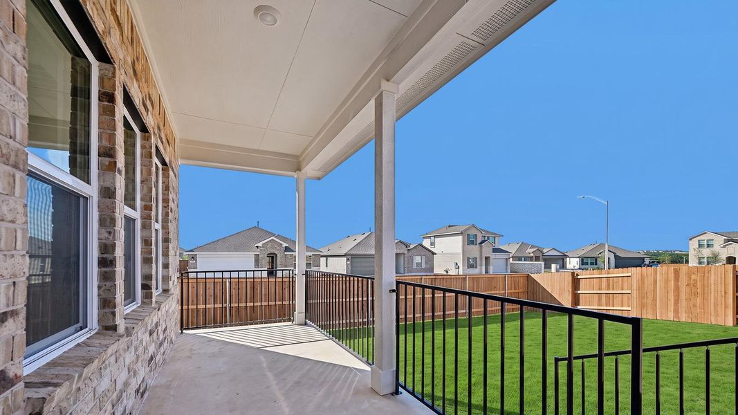 Exterior details and patio area of a home in Bar W Ranch, Leander (Image 19).