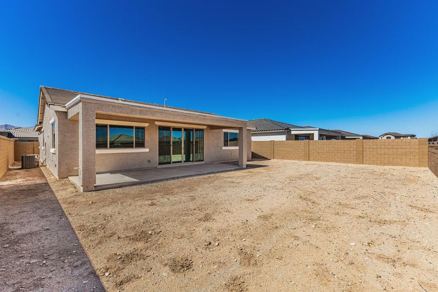 Exterior details and patio area of a home in Forté at Granite Vista, Waddell (Image 29).