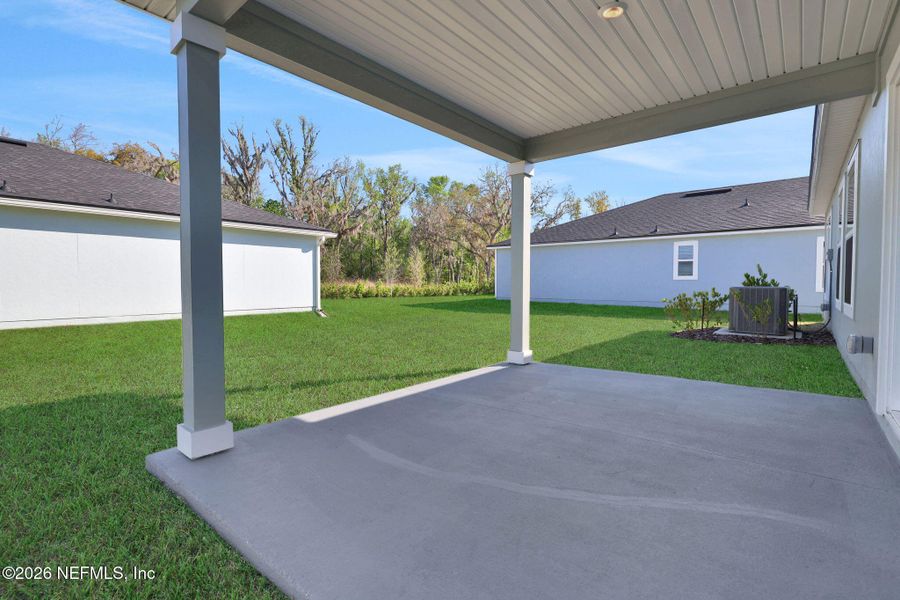 Exterior details and patio area of a home in Wilford Oaks, Orange Park (Image 26).