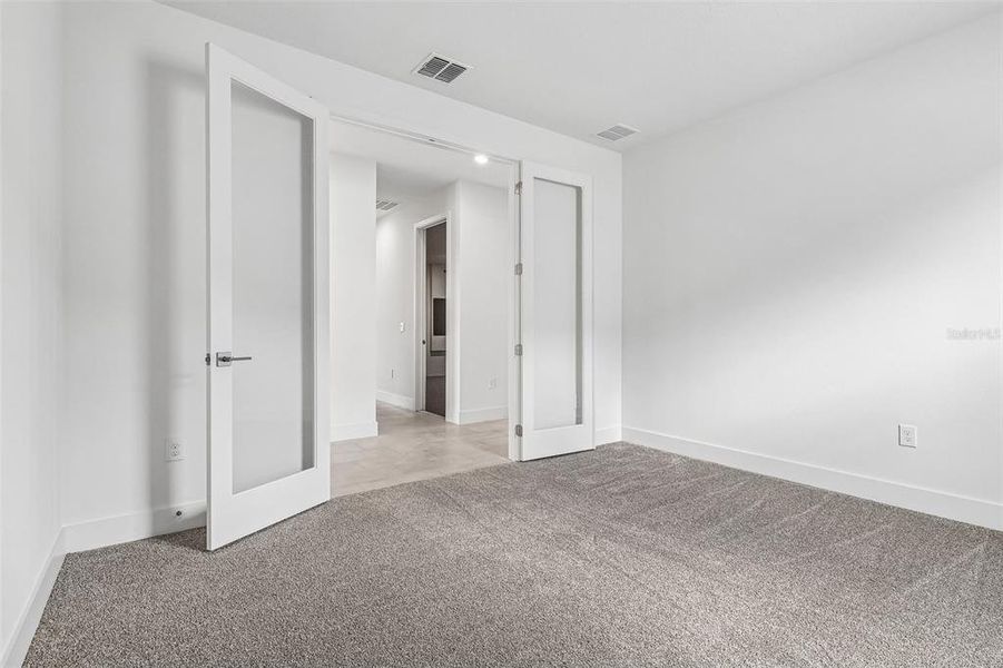 Spacious, unfurnished interior of a new home in Lakeside at Satilla, St. Cloud (Image 21).