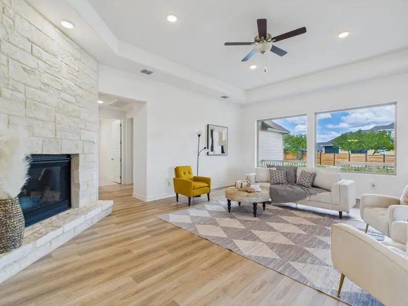 Furnished interior view inside a new home in Potranco Oaks, Castroville (Image 9).