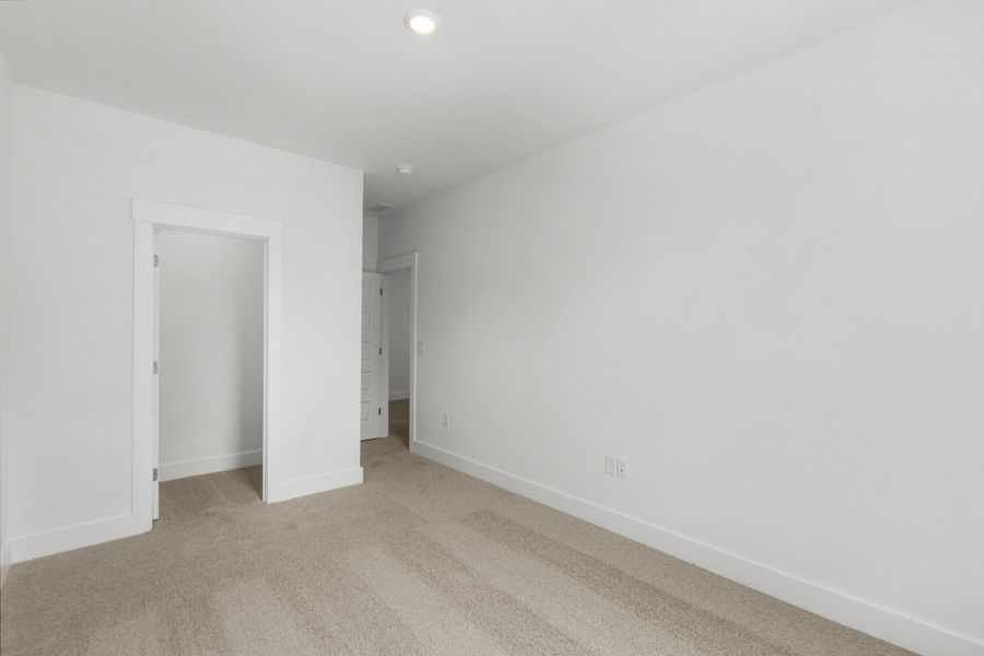 Spacious, unfurnished interior of a new home in Long Bay Golf Club, Longs (Image 38).