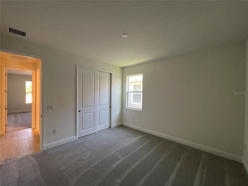 Spacious, unfurnished interior of a new home in Angeline, Land O' Lakes (Image 41).