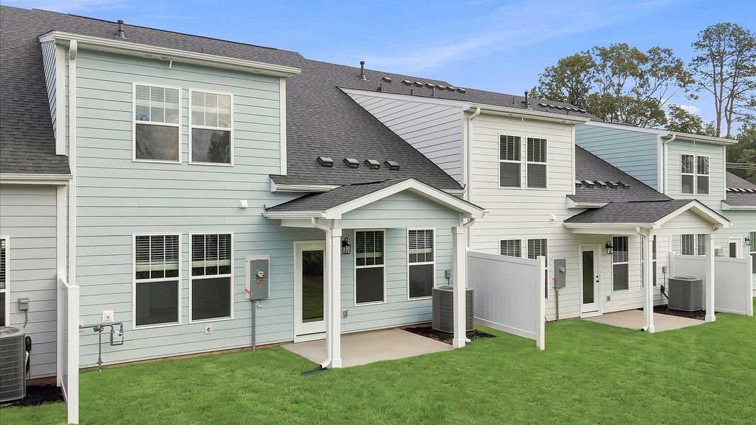 Refined rear exterior with a stylish covered porch for dining, relaxing, or entertaining near Lake Hartwell