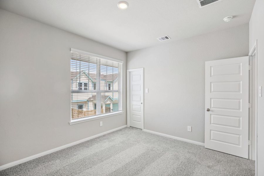 Spacious, unfurnished interior of a new home in Kemah Crossing - Luxe Series, Kemah (Image 23). Spacious, unfurnished interior of a new home in Kemah Crossing - Luxe Series, Kemah (Image 23).