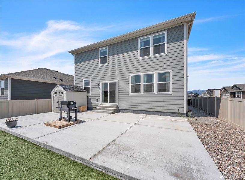 Front exterior of a new home in , Fountain, CO, highlighting curb appeal (Image 1).